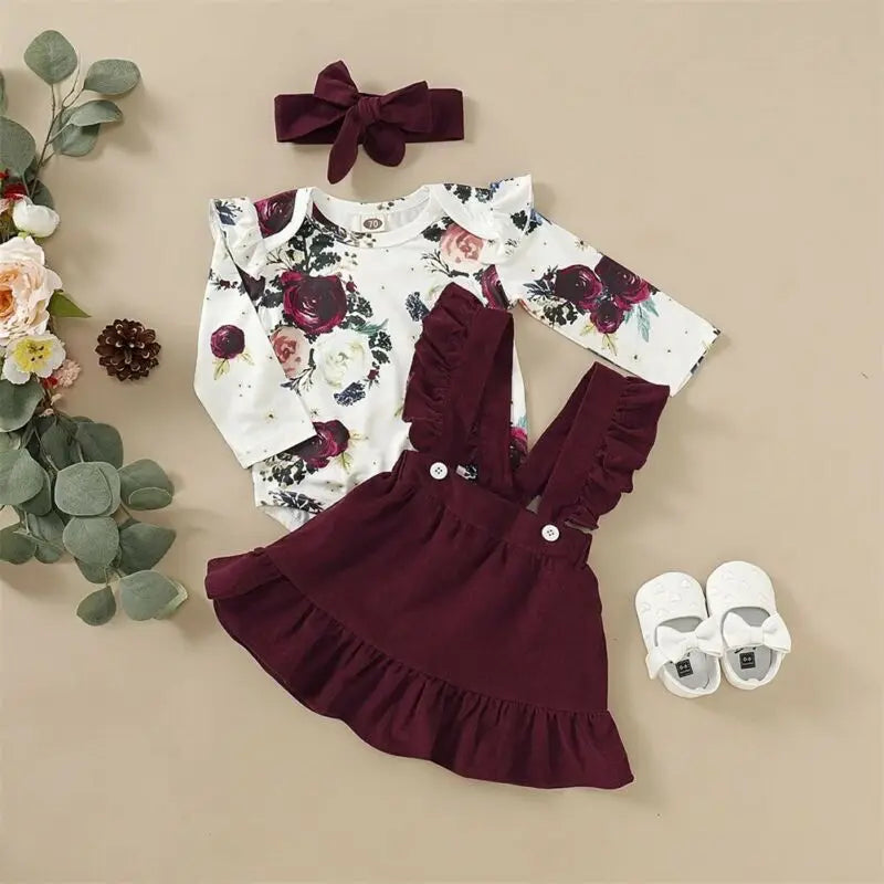 Newborn Baby Girl Floral Bodysuit Set with Suspender Skirt and Bow Headband in burgundy and white