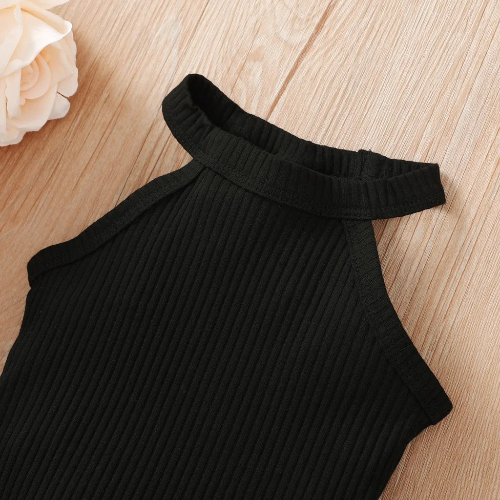 Close-up of black ribbed sleeveless top from 2PCS Baby Girl Clothing Set by Yamza Tots Closet