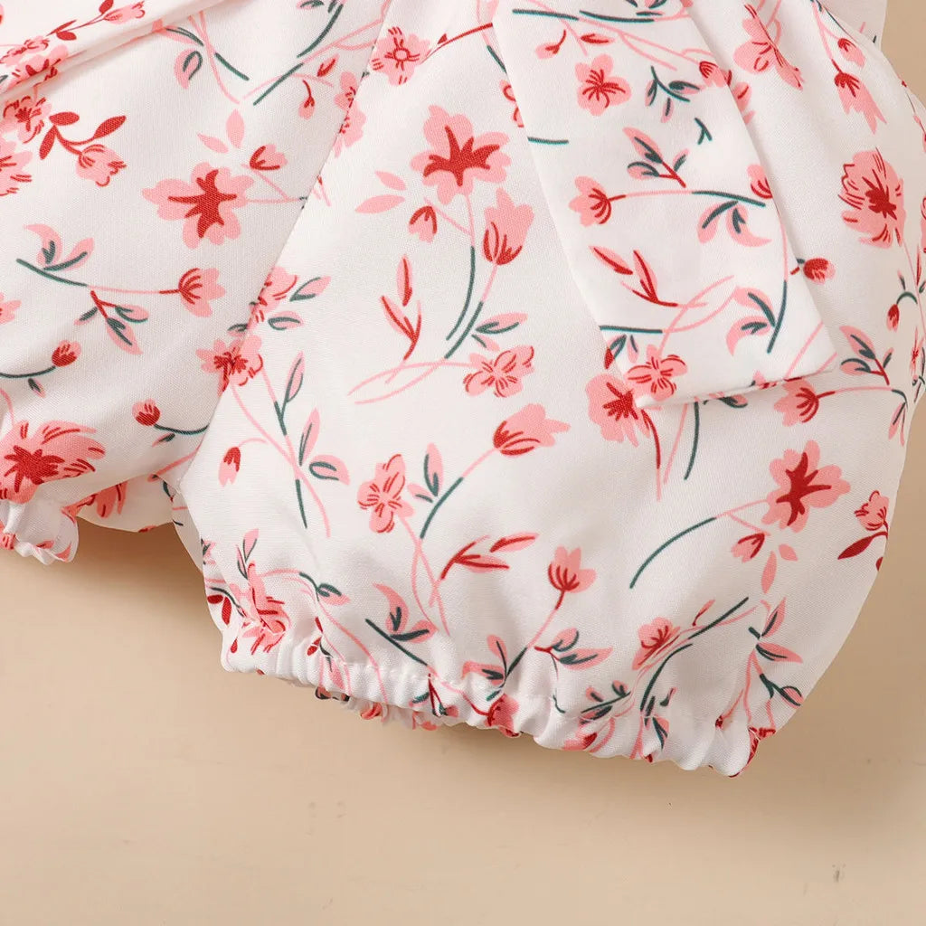 Adorable Baby Girl Clothing Set 3PCS Bodysuit & Accessories with pink floral pattern on white fabric