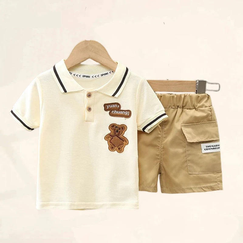 Baby boy summer clothing set with cartoon bear T-shirt and shorts, perfect for kids aged 4-6 years.