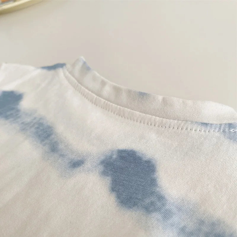 Close up of soft white and blue tie-dye T-shirt from Baby Boy's Clothing Outfits Sets T-shirt & Shorts suits by Yamza Tots' Closet