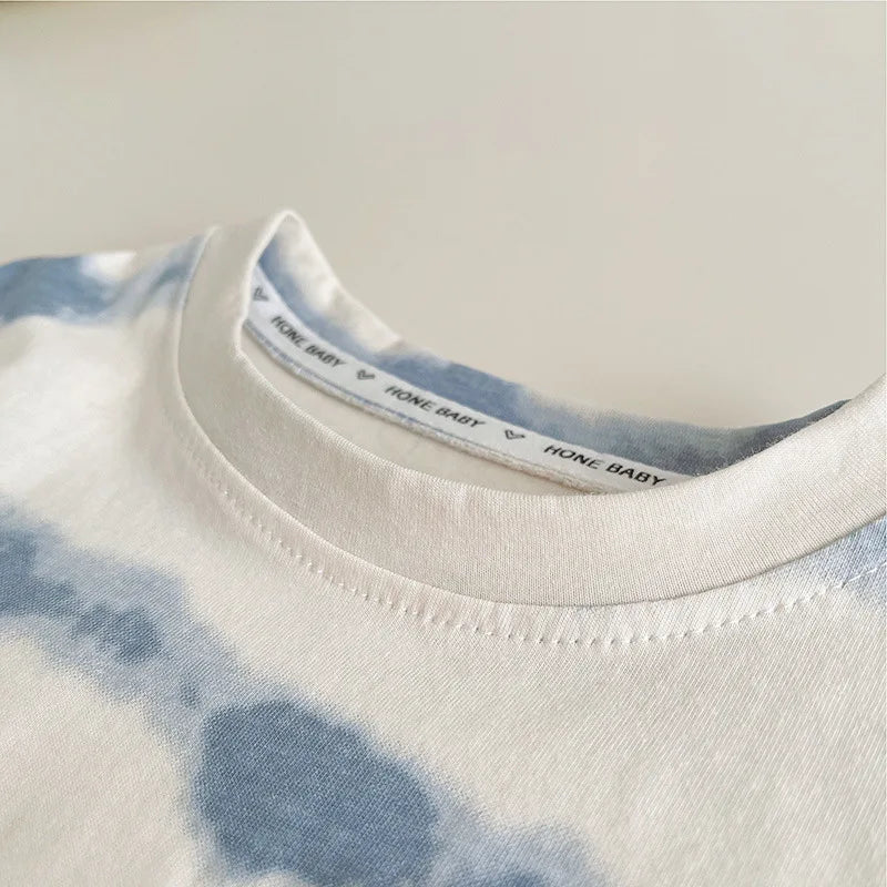 Close-up of blue and white tie-dye Baby Boy's Clothing Outfits Sets T-shirt & Shorts suits collar by Yamza Tots' Closet