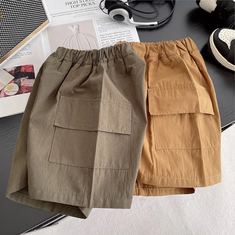 Two pairs of toddler shorts in olive and tan colors from Yamza Tots' Closet, suitable for baby boys striped clothing suits
