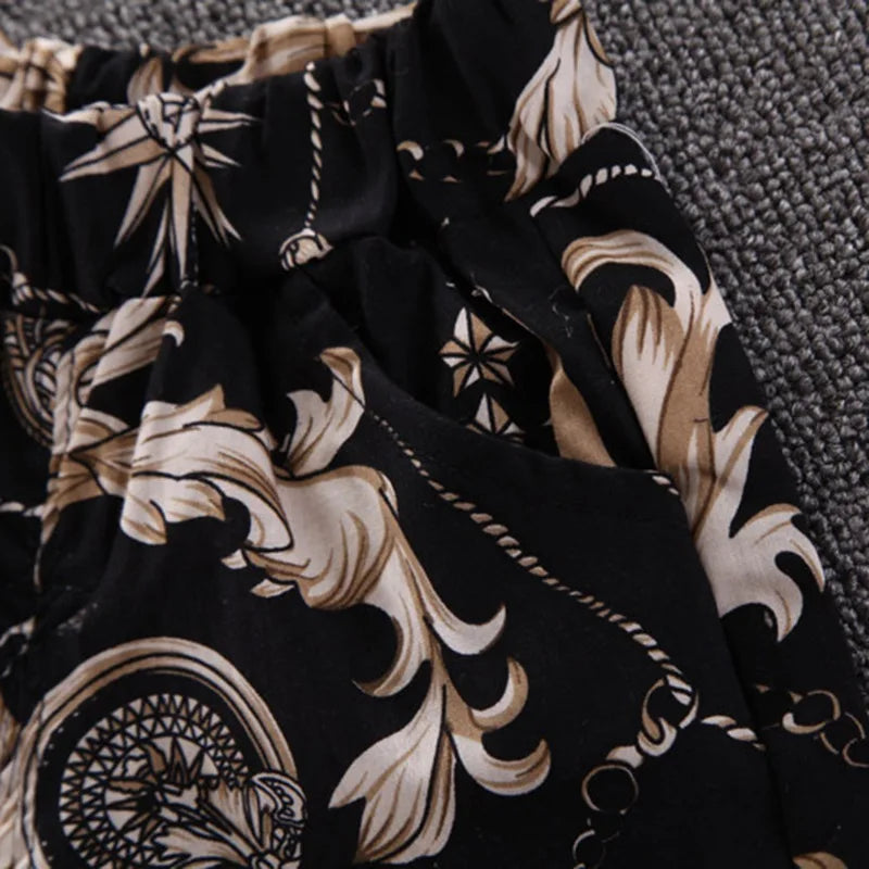 Black fabric with beige floral and geometric design Baby Boy's Suit Fashion Print Clothes by Yamza Tots' Closet