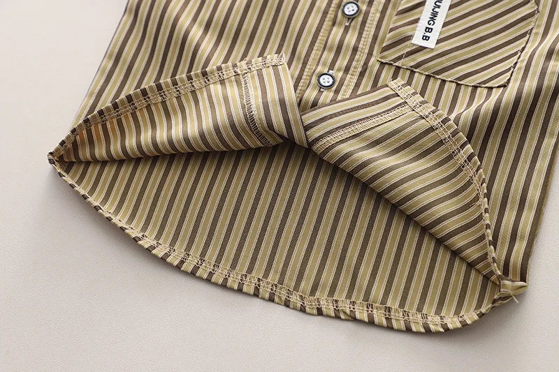 Close-up of striped brown and beige shirt hem from Baby Boys Summer Set Striped Shirts Tees and Shorts by Yamza Tots' Closet
