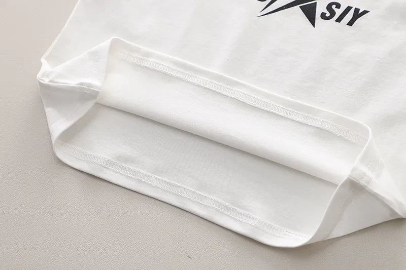Close-up of soft white fabric detail from Baby Boys Summer Set Striped Shirts Tees and Shorts
