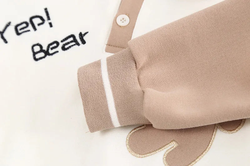 Close-up of Baby Clothes Children Set Boys T-Shirt Pants 2Pcs Sets with beige sleeve and bear embroidery