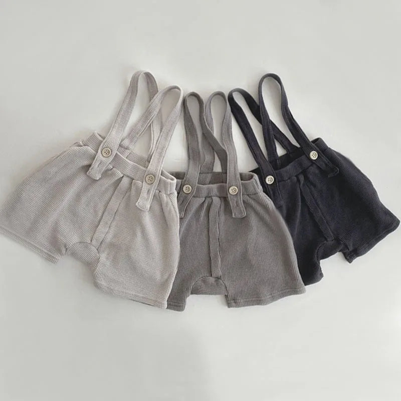 Baby Corduroy Overalls Romper Jumpsuit Backless Outfit Unisex in beige gray and black colors with button straps