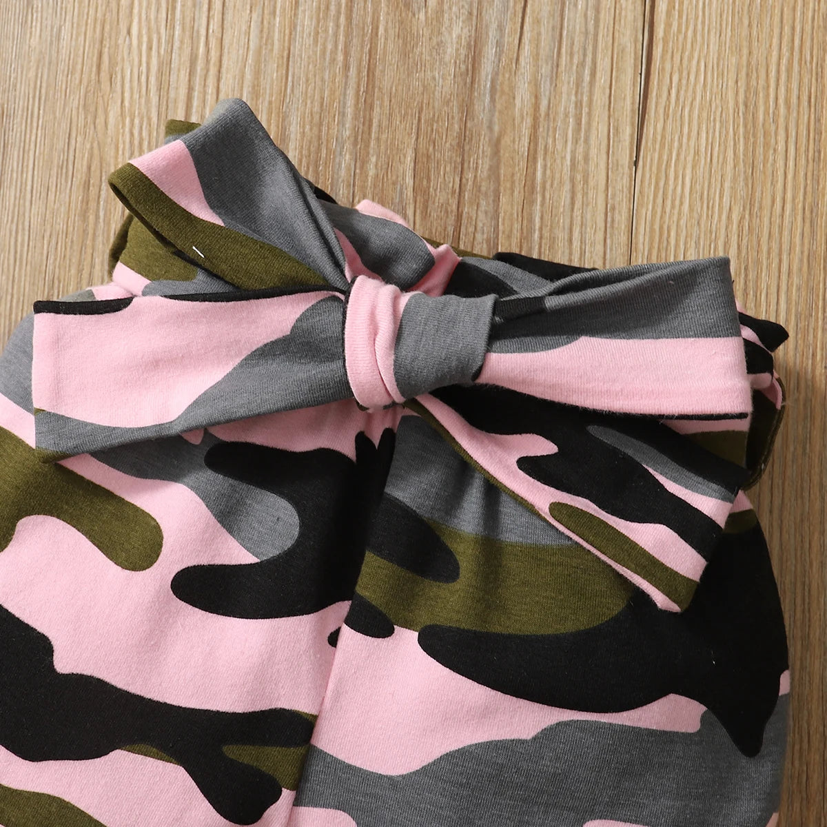 Baby Girl Camouflage Outfit Set with Long Sleeve Bodysuit and Headband featuring pink and green camo pattern