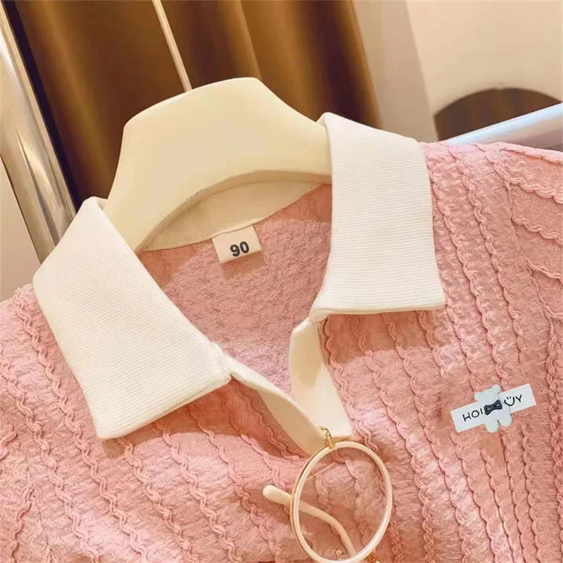 Pink textured baby girl top with white collar hanging on hanger Baby Girl Cute Casual Top & Pants Set Summer Kids Comfort Outfit