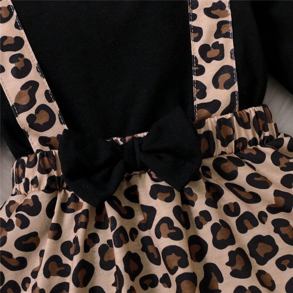 Baby Girl Dress with Bow featuring leopard print suspenders and black bow detail by Yamza Tots Closet