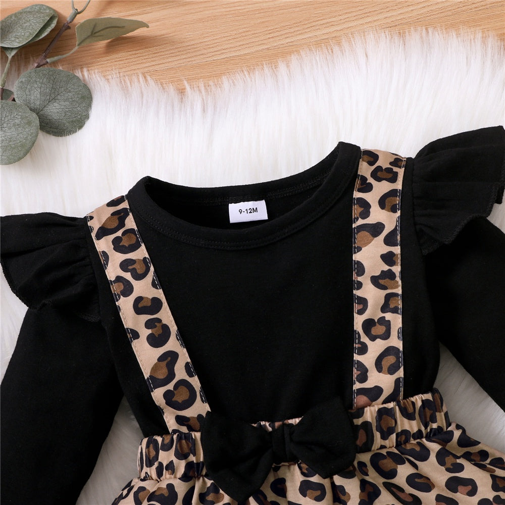 Baby Girl Dress with Bow featuring black top and leopard print skirt with suspenders
