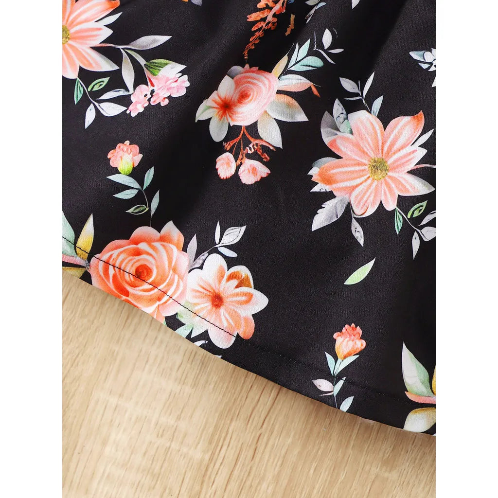 Baby Girl Summer Clothes Floral Print Sleeveless Dresses close-up of floral fabric on wooden surface