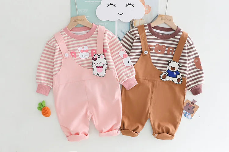 Yamza Tots' Closet baby girls and boys clothing featuring cute pink and brown overalls with striped long sleeve shirts