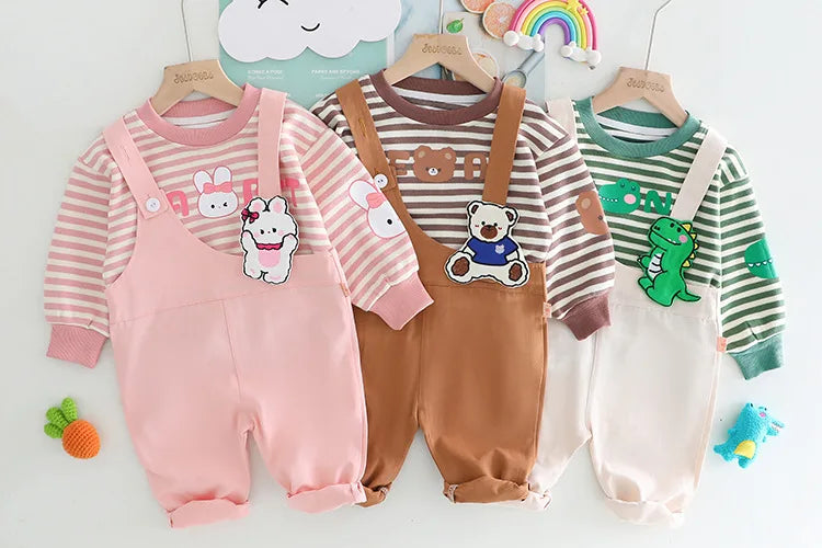 Yamza Tots' Closet baby girls and boys clothing featuring striped tops with animal prints and matching overalls in pink, brown, and cream