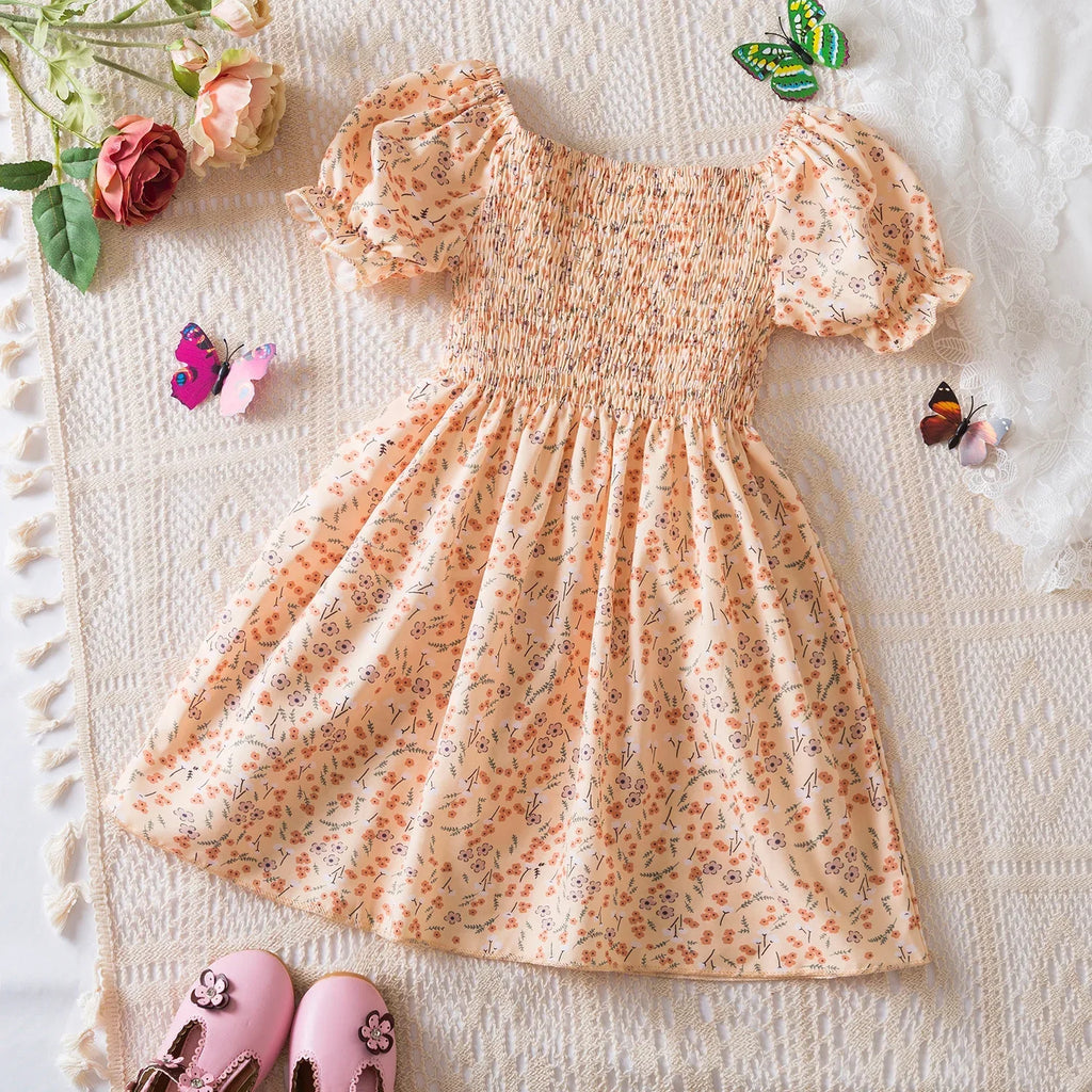 Baby Girls Floral Short Sleeve Dress Casual Summer Outfit for Kids in light peach with small floral print and puff sleeves
