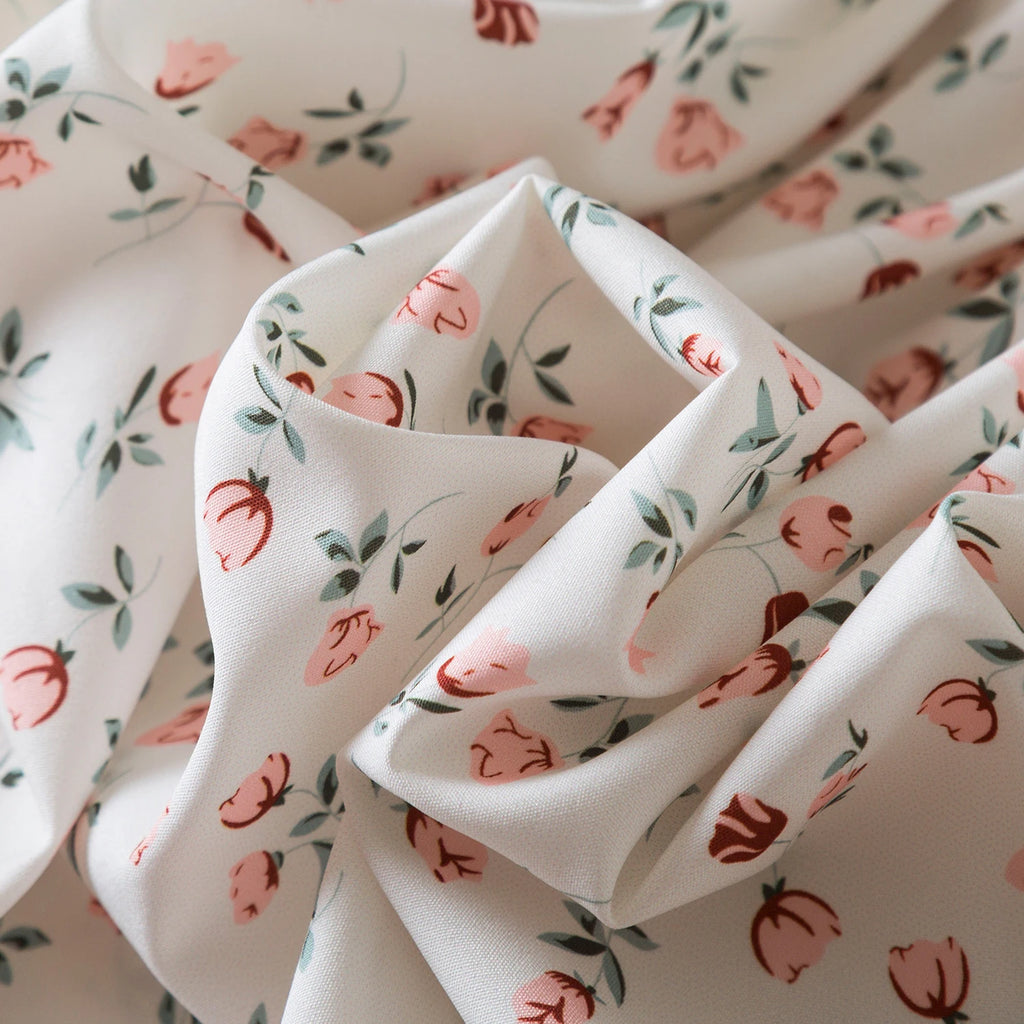 Close-up of soft fabric with pink and green floral pattern for Baby Girls Floral Short Sleeve Dress Casual Summer Outfit for Kids