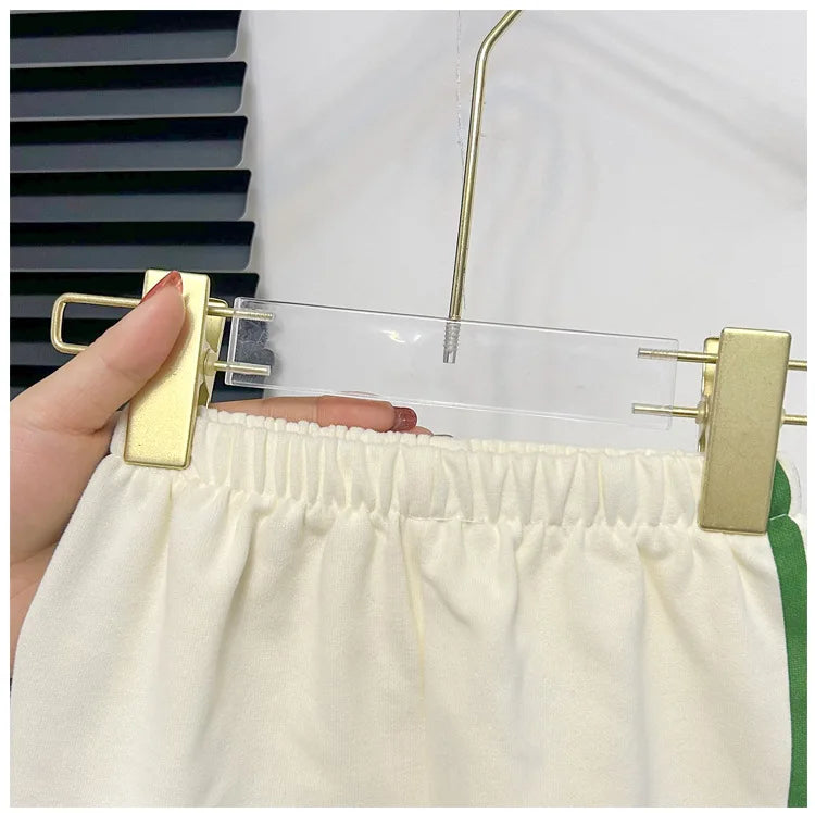 Close-up view of white elastic waistband shorts from Baby Striped Short Sleeve T-shirt Set Summer Loungewear for Boys Girls