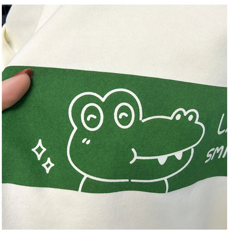 Close-up of Baby Striped Short Sleeve T-shirt Set Summer Loungewear for Boys Girls featuring a cute green crocodile graphic