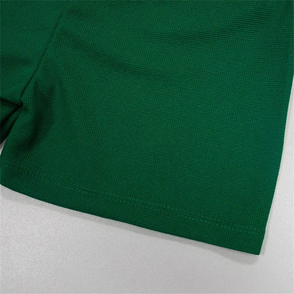 Close-up of green fabric shorts from Baby Summer Casual Set Loose Cute Top and Shorts Two-Piece Outfit by Yamza Tots Closet