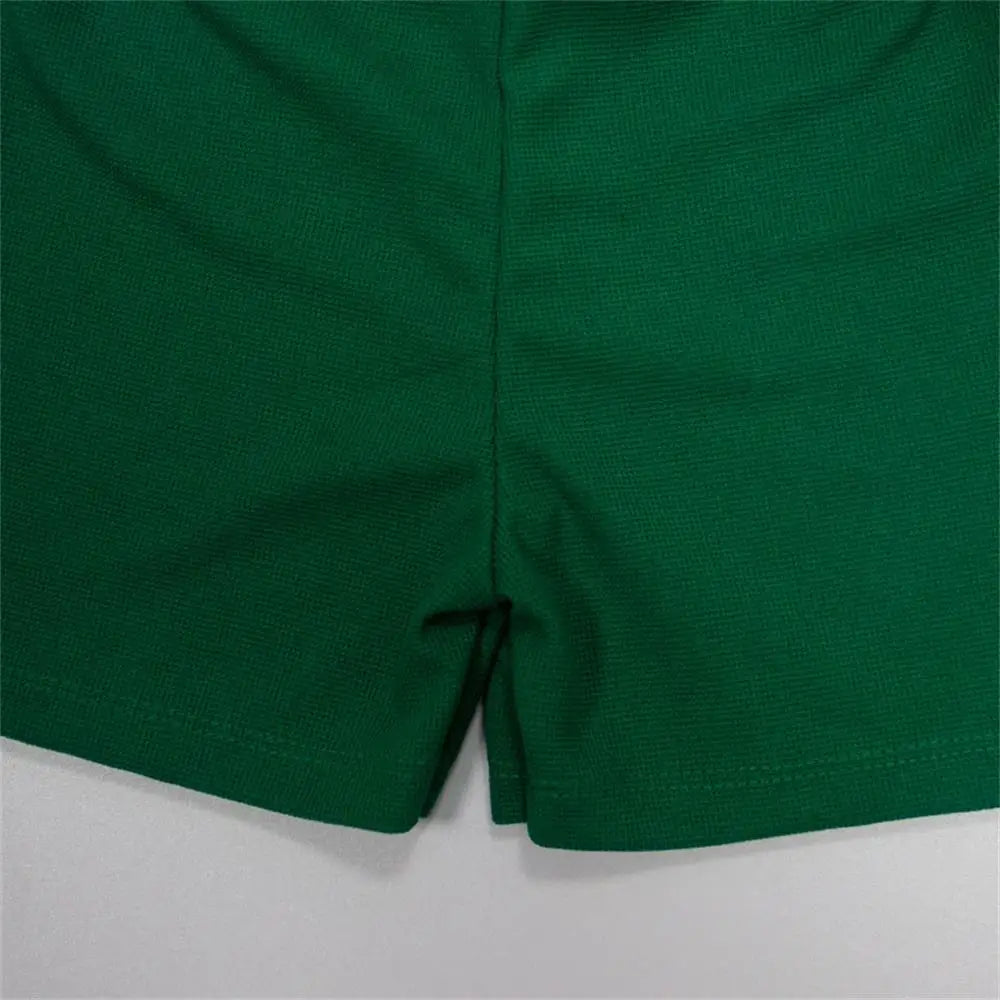 Close-up of green shorts from Baby Summer Casual Set Loose Cute Top and Shorts Two-Piece Outfit