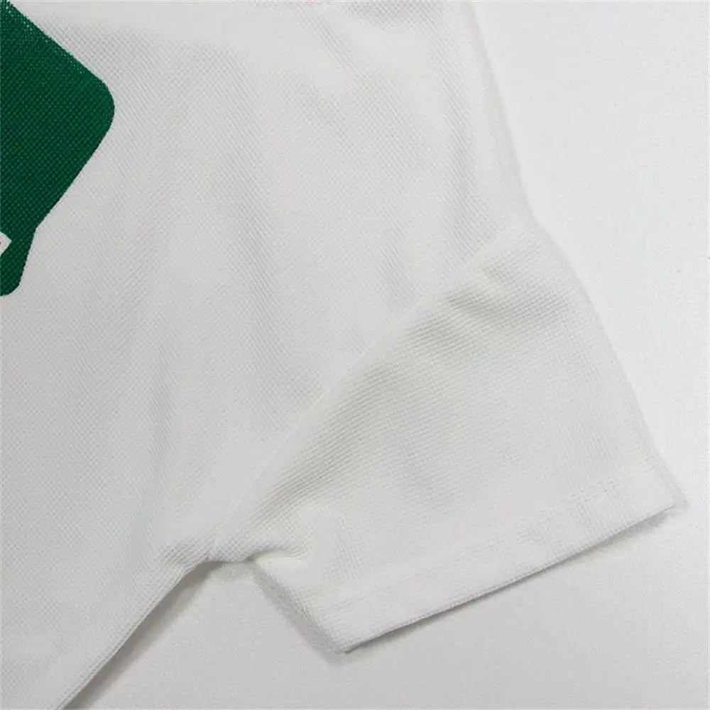 Close-up of white short sleeve baby top detail from Baby Summer Casual Set Loose Cute Top and Shorts Two-Piece Outfit