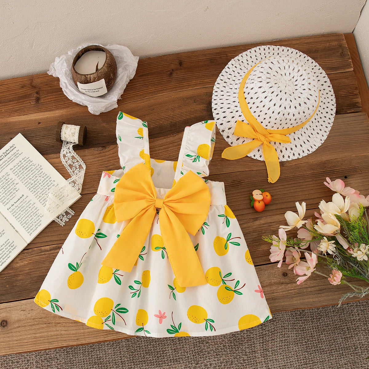 Beach Dress Casual Fruit Printed with Hat Suit featuring yellow fruit print and large bow on white dress