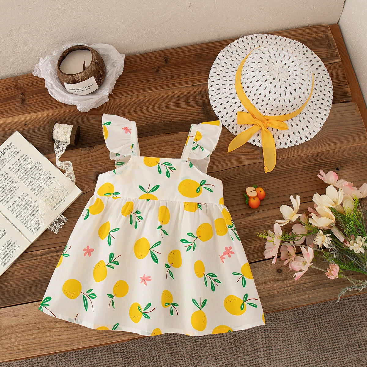 Beach Dress Casual Fruit Printed with Hat Suit featuring a white dress with yellow fruit prints and a white hat with yellow ribbon