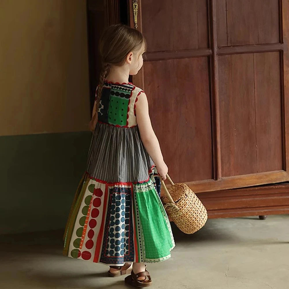Bear Leader Girls Summer Dress Round Neck Sleeveless Multicolor Geometric Dress worn by a girl holding a wicker basket