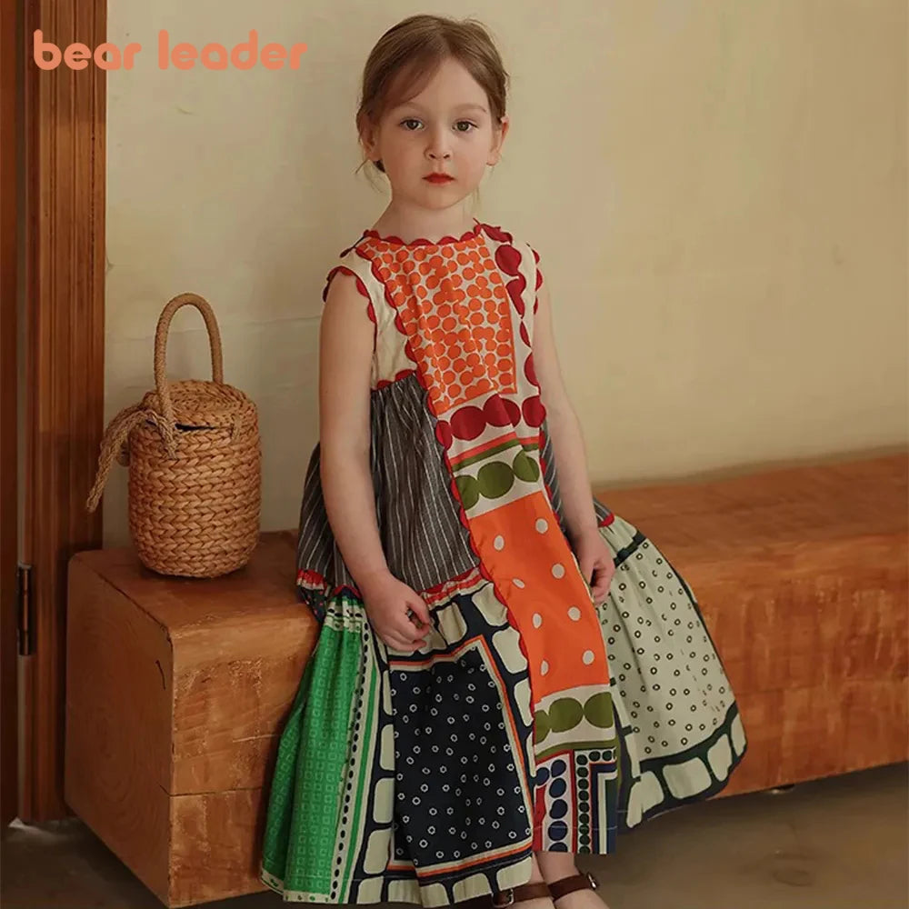 Bear Leader Girls Summer Dress Round Neck Sleeveless Multicolor Geometric Dress worn by child sitting on wooden bench