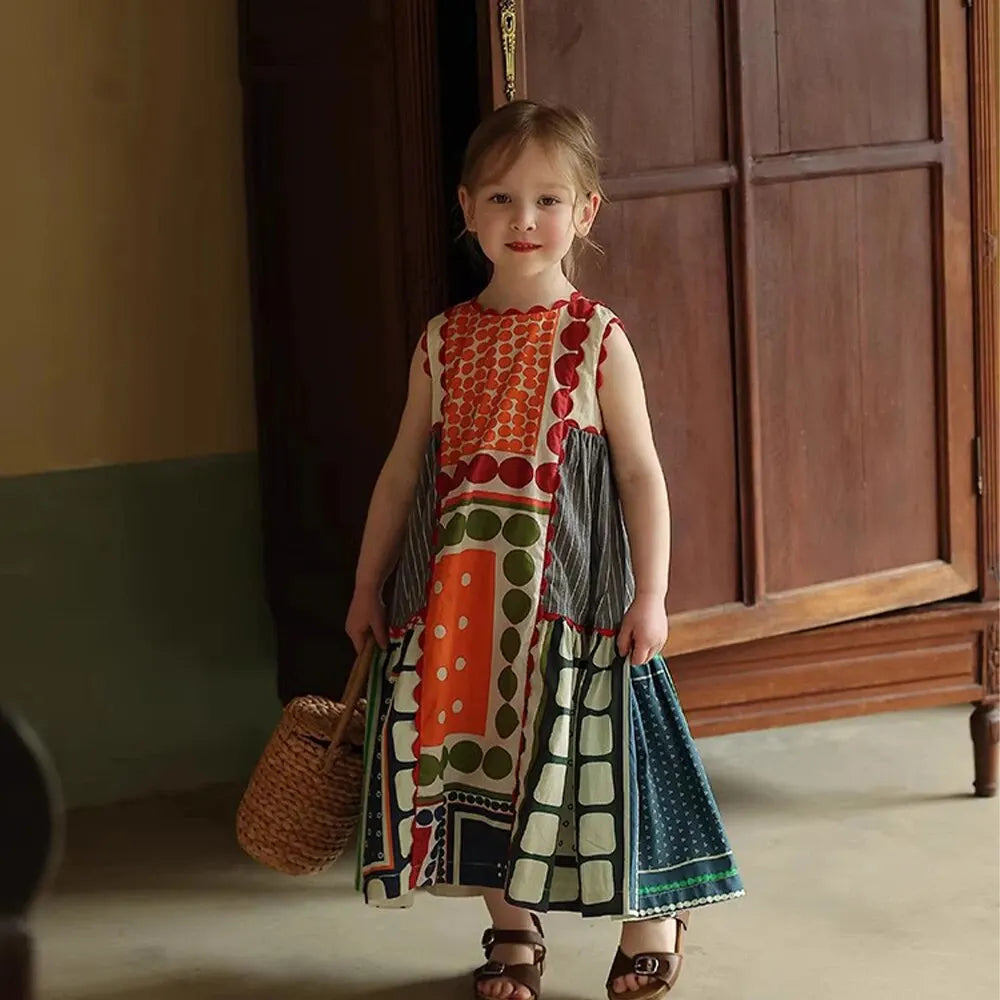 Bear Leader Girls Summer Dress Round Neck Sleeveless Multicolor Geometric Dress worn by a young girl holding a woven basket  