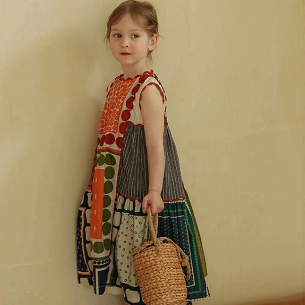 Bear Leader Girls Summer Dress Round Neck Sleeveless Multicolor Geometric Dress worn by child holding woven bag