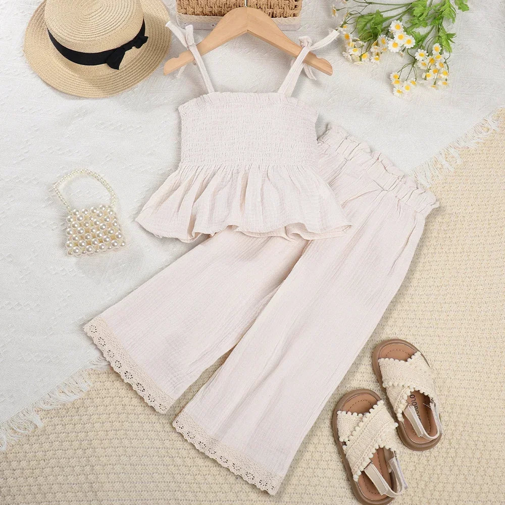 Korean Kids Summer Organic Cotton Girls Camisole Top with Lace Wide Leg Pants laid flat with straw hat and sandals