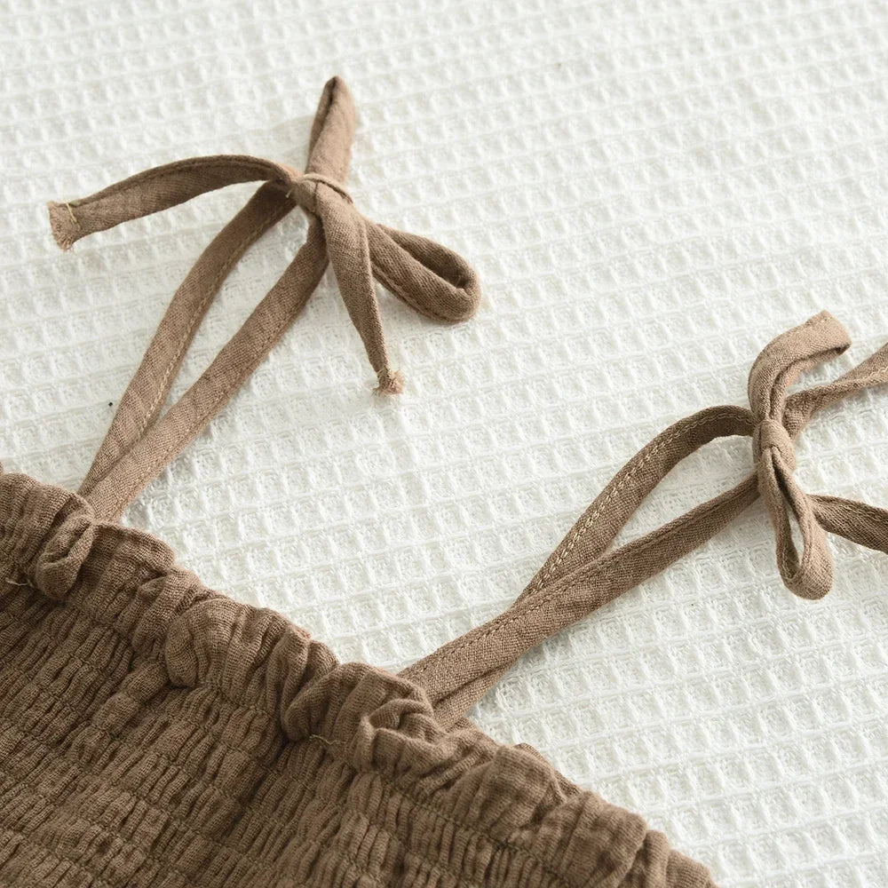 Close-up of Korean Kids Summer Organic Cotton Girls Camisole Top with Lace Wide Leg Pants brown fabric tied straps