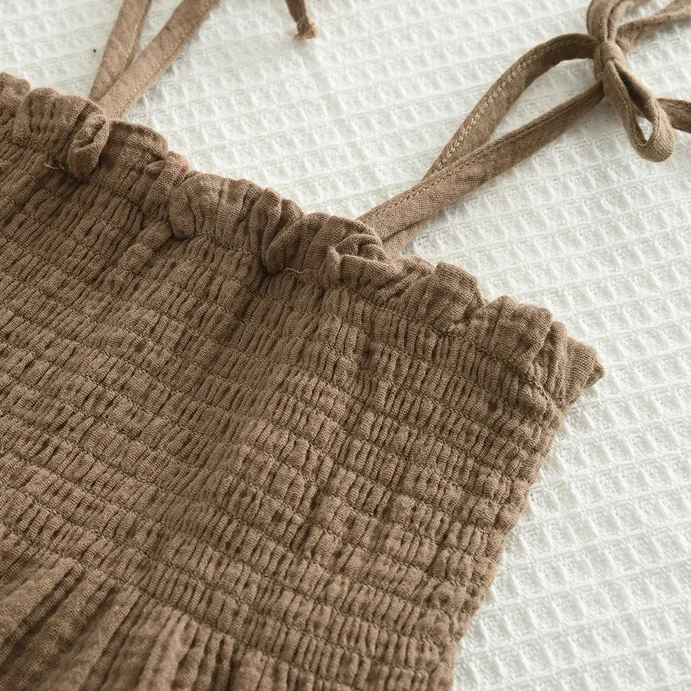 Close-up view of brown Korean Kids Summer Organic Cotton Girls Camisole Top with Lace Wide Leg Pants fabric texture and strap details