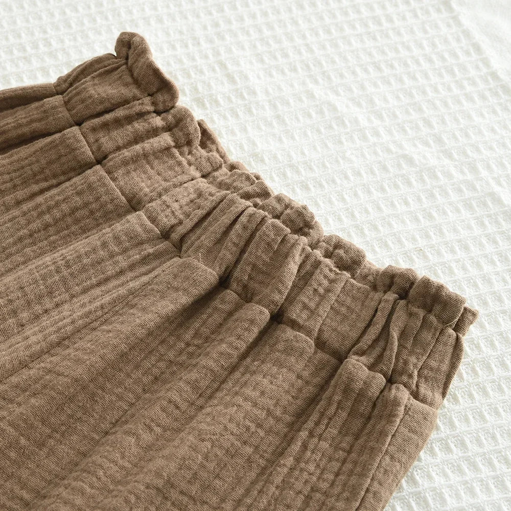 Close-up of brown lace wide leg pants from Korean Kids Summer Organic Cotton Girls Camisole Top with Lace Wide Leg Pants