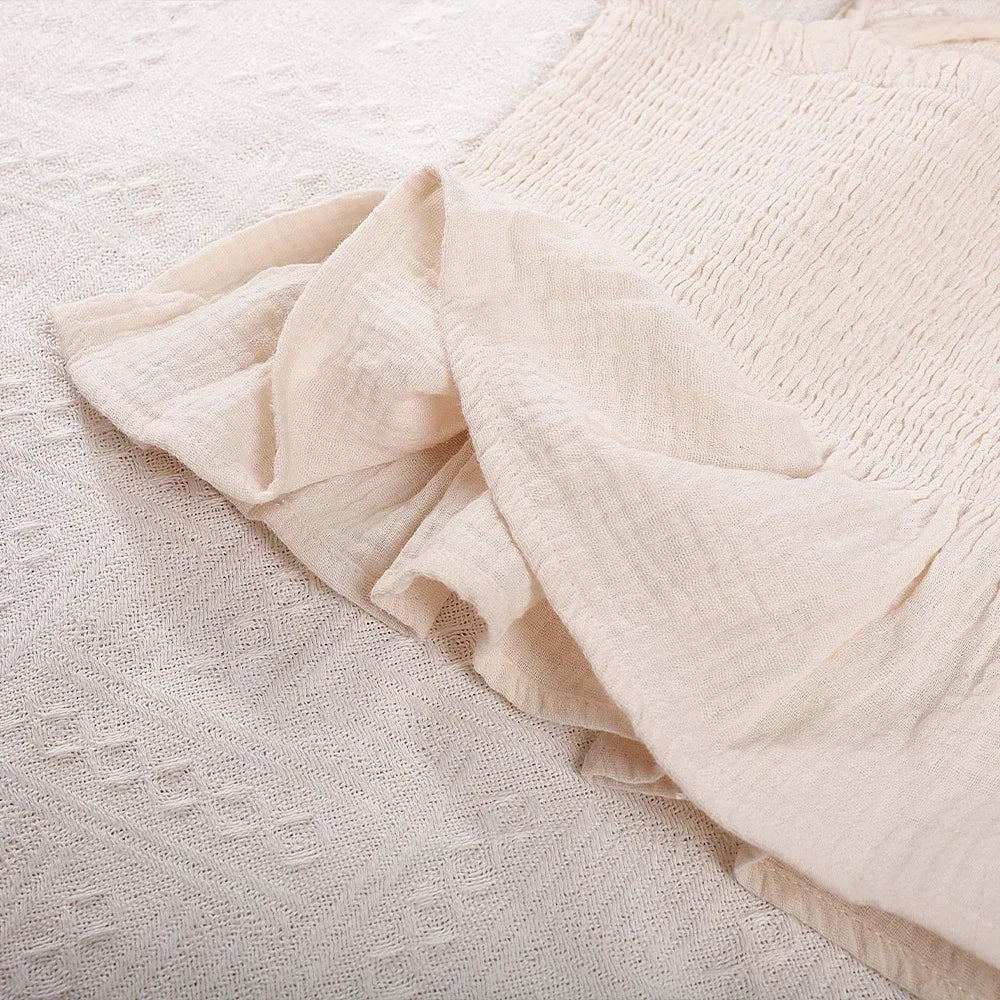 Close-up of Korean Kids Summer Organic Cotton Girls Camisole Top with Lace Wide Leg Pants in soft beige fabric