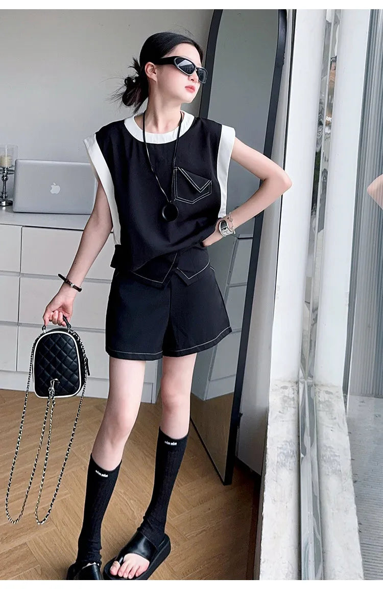 Black and White Spliced Vest and Shorts Two-Piece Casual Sports Outfit Set by Yamza Tots Closet worn with black socks and sandals