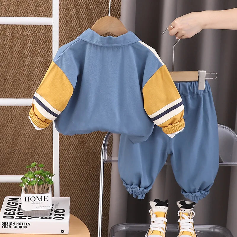 Boys Cartoon Excavator Jacket T-shirt and Pants Tracksuit Set for Autumn in blue with yellow accents and elastic cuffs