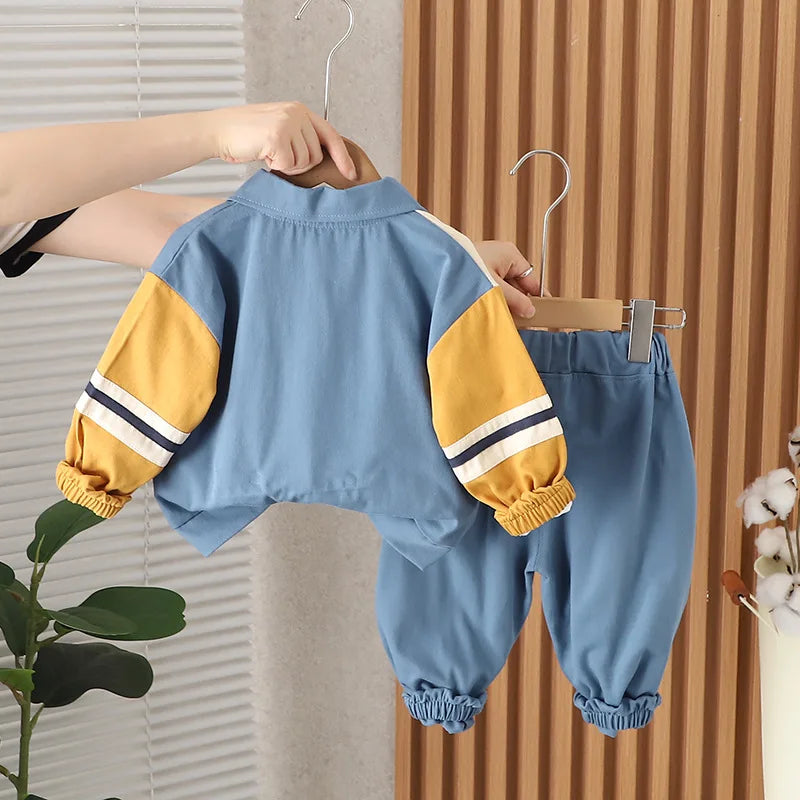 Boys Cartoon Excavator Jacket T-shirt and Pants Tracksuit Set for Autumn in blue with yellow sleeves and elastic cuffs