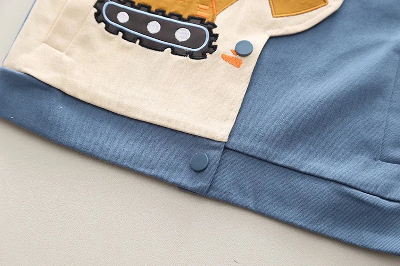 Close-up of Boys Cartoon Excavator Jacket T-shirt and Pants Tracksuit Set for Autumn with blue buttoned hem detail