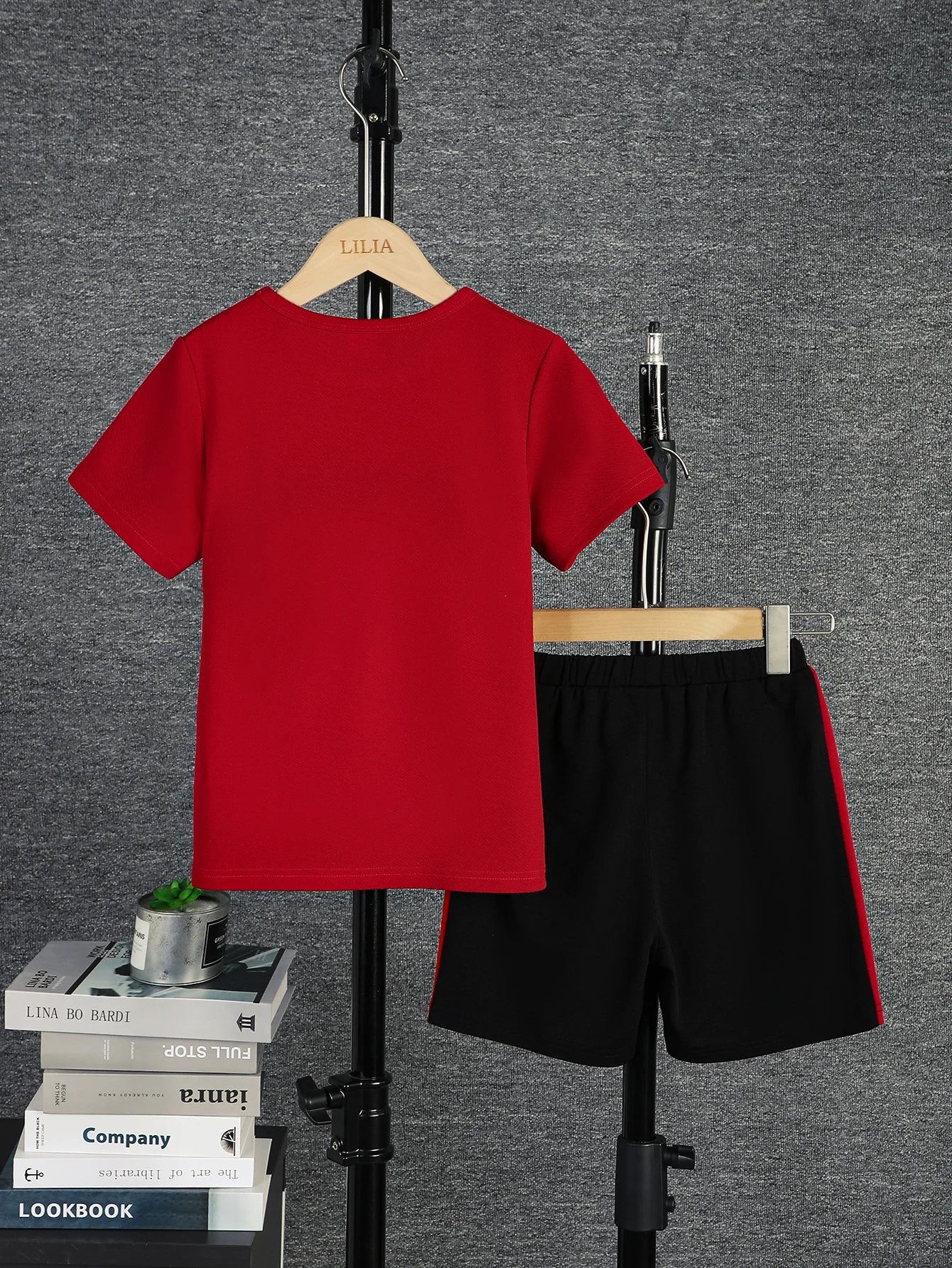 Boys Casual 2pcs Color block Short Sleeve T-shirt and Shorts Set with red top and black shorts on hanger