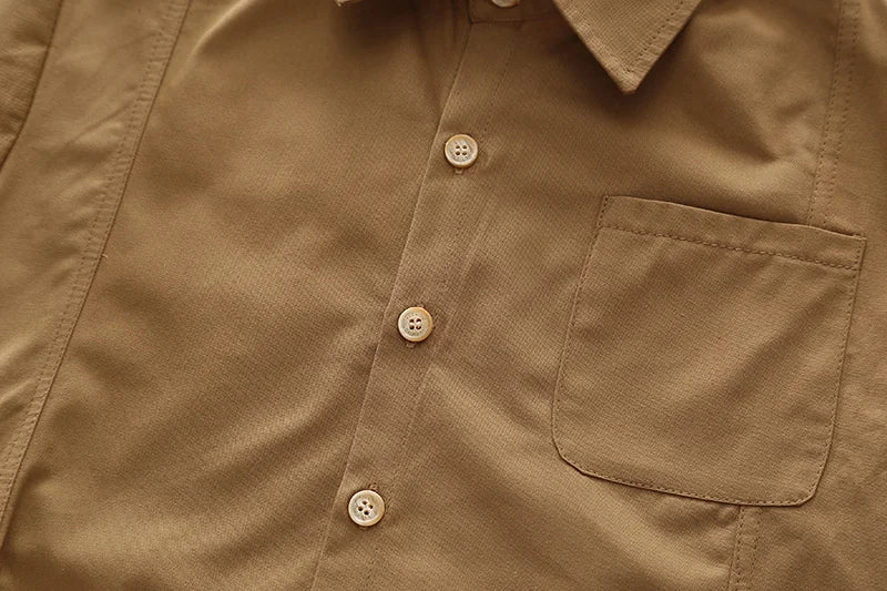 Close-up of boys' long sleeve shirt in brown color part of Boys' Casual Fashion Set Long Sleeve Shirt & Cargo Pants Trendy Daily Wear