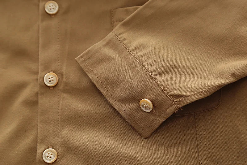 Close-up of brown long sleeve shirt buttons and cuff from Boys' Casual Fashion Set Long Sleeve Shirt & Cargo Pants