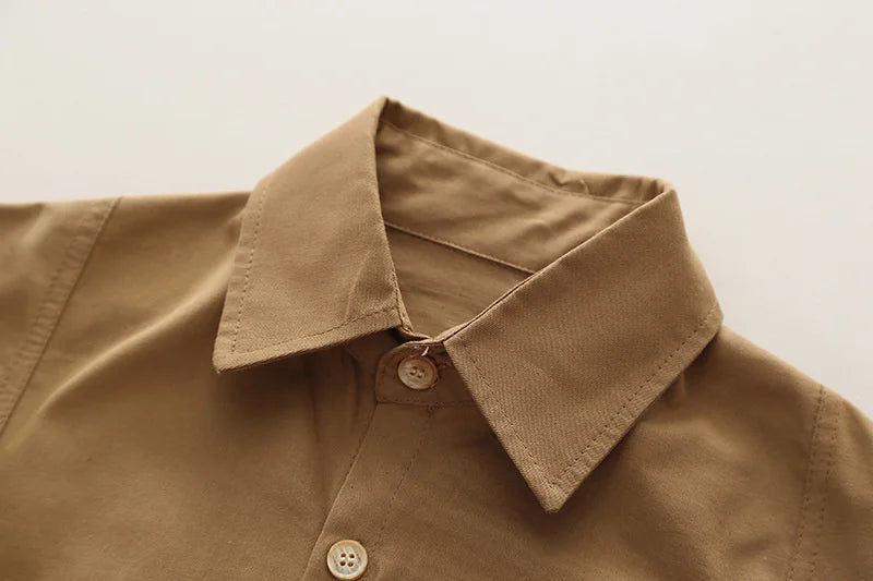 Close-up of brown long sleeve shirt collar with buttons from Boys' Casual Fashion Set Long Sleeve Shirt & Cargo Pants