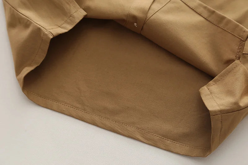 Close-up of brown cargo pants hem from Boys' Casual Fashion Set Long Sleeve Shirt & Cargo Pants Trendy Daily Wear