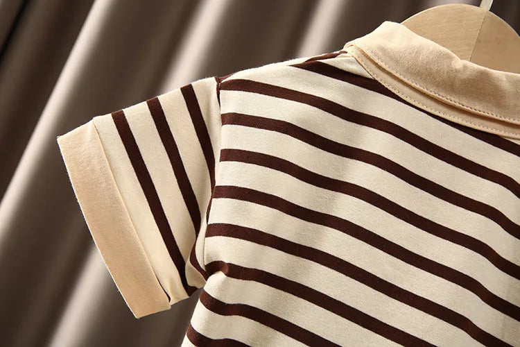 Close-up of Boys Korean Fashion Stripe Short Sleeve Top and Pants Summer Kids Outfit Set beige and brown stripes