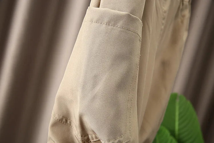 Close-up of beige pants pocket detail from Boys Korean Fashion Stripe Short Sleeve Top and Pants Summer Kids Outfit Set 