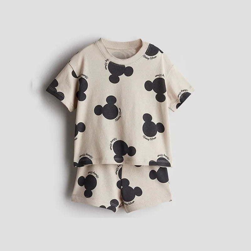 Boys Simba Print Short Sleeve T-Shirt and Shorts Tracksuit Summer Outfit in beige with black character prints