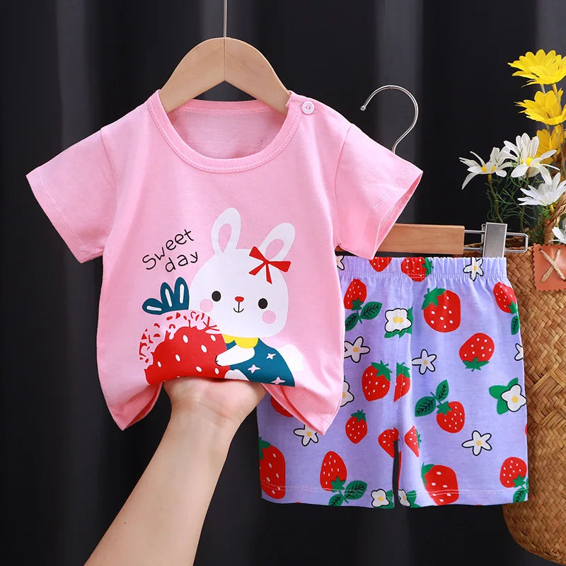 Cartoon Kids Clothes 2 Piece Set Donald Duck T-shirt and Shorts Summer Outfit with pink bunny top and strawberry print shorts